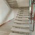 Процесс заливки монолитной лестницы в гостиной дома М456
